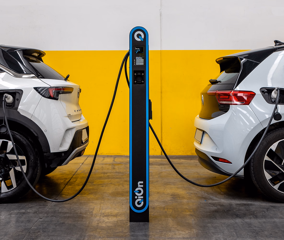 AC charger from QiOn in a parking lot