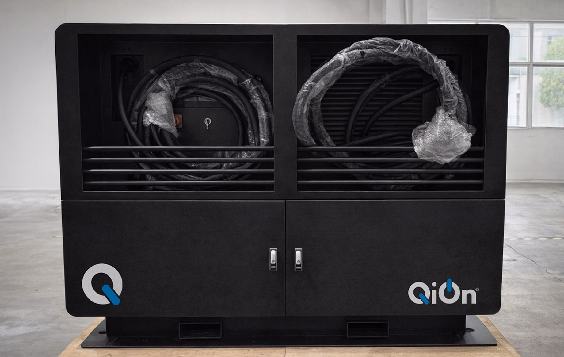 SUPERBRIQ truck charging at parking service