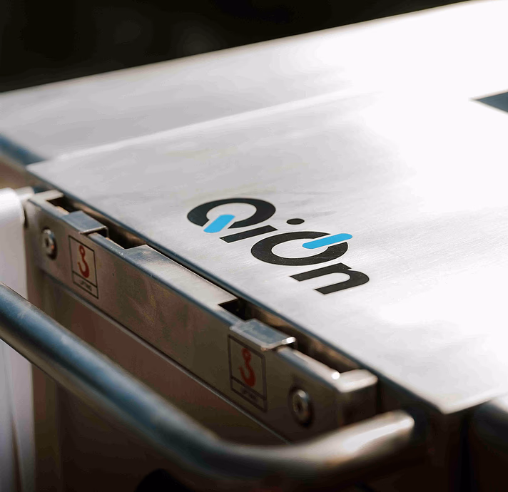 Hanger from QiOn mobile charger production